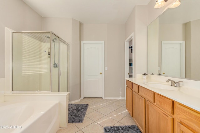 bathroom with shower with separate bathtub, tile patterned floors, and vanity