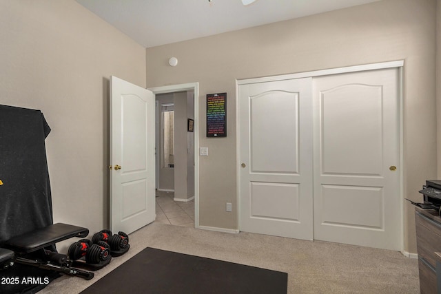 exercise area with light colored carpet