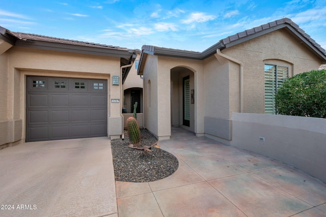 view of front of home featuring a garage