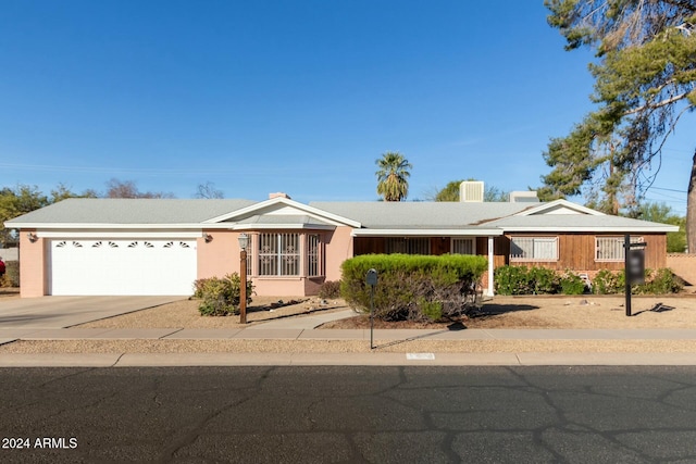 ranch-style home with a garage