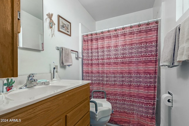 bathroom featuring vanity and walk in shower