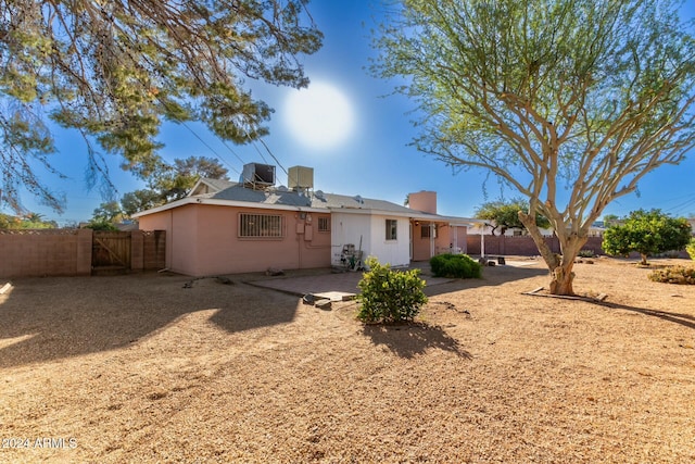 rear view of property featuring a patio area