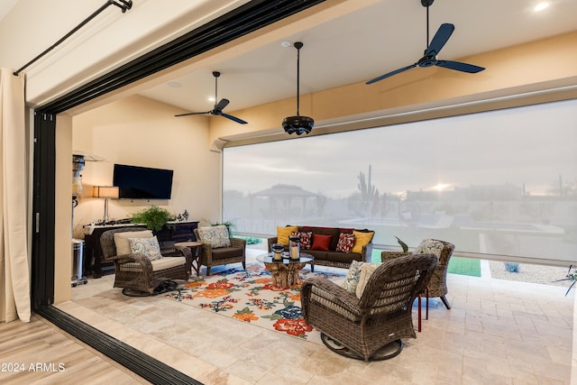 view of patio / terrace featuring an outdoor living space and ceiling fan