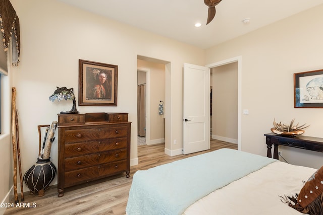 bedroom with light hardwood / wood-style floors