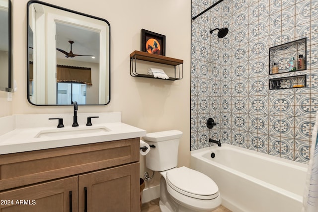 full bathroom with vanity, toilet, and  shower combination