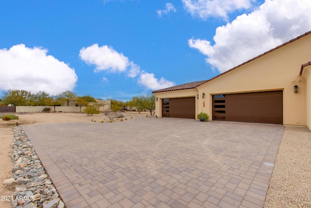 exterior space featuring a garage