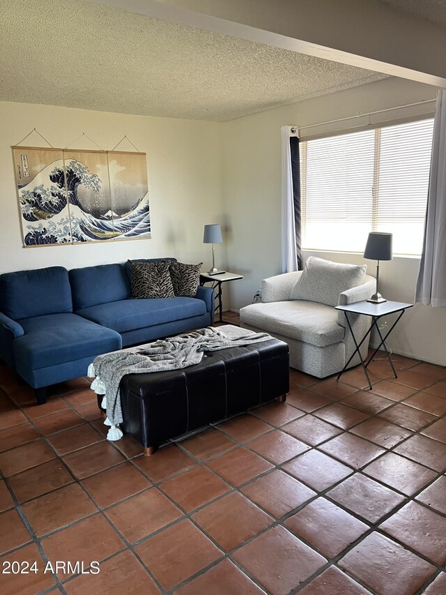 living room featuring a fireplace and tile patterned floors