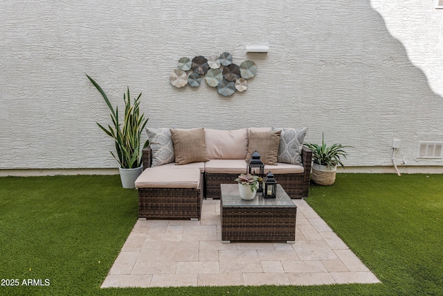 view of patio / terrace with visible vents and an outdoor hangout area