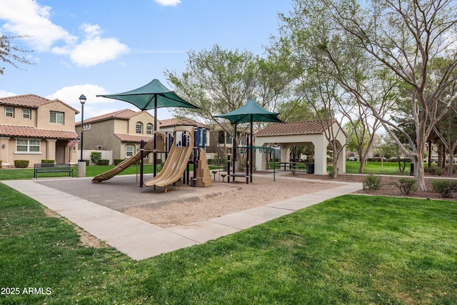 communal playground with a gazebo and a lawn