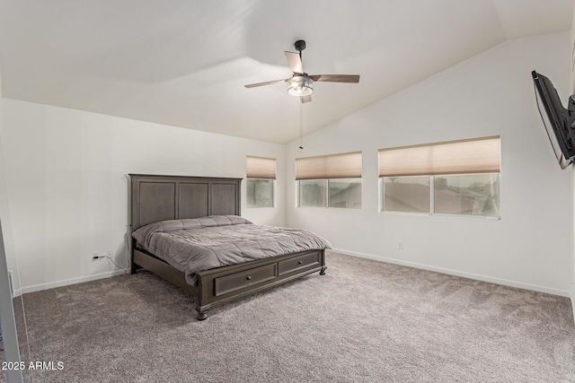 carpeted bedroom featuring ceiling fan, baseboards, and vaulted ceiling