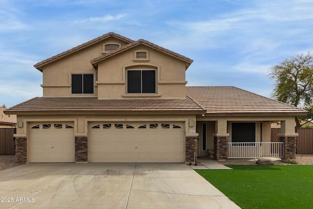 view of front of home featuring concrete driveway, stone siding, an attached garage, fence, and stucco siding