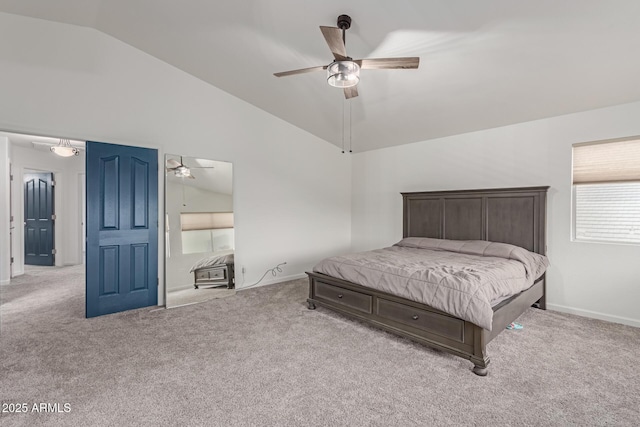 carpeted bedroom with high vaulted ceiling, ceiling fan, and baseboards