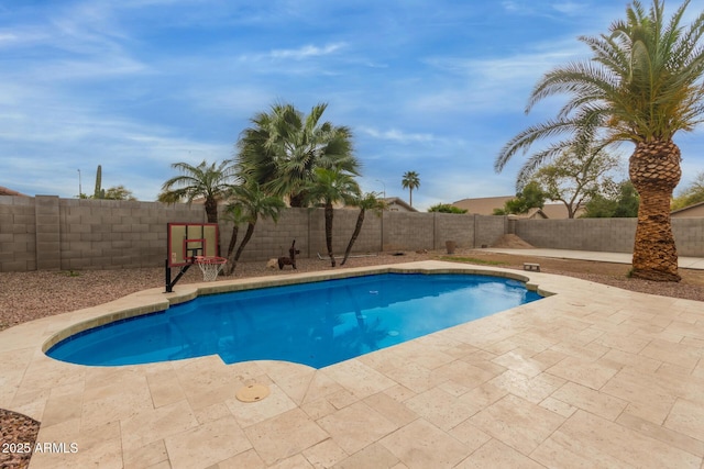 view of pool featuring a patio area, a fenced backyard, and a fenced in pool