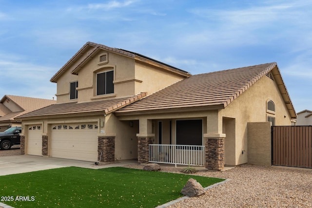 view of front facade featuring stone siding, concrete driveway, and stucco siding