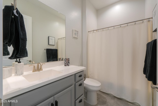 full bath with toilet, tile patterned flooring, and vanity