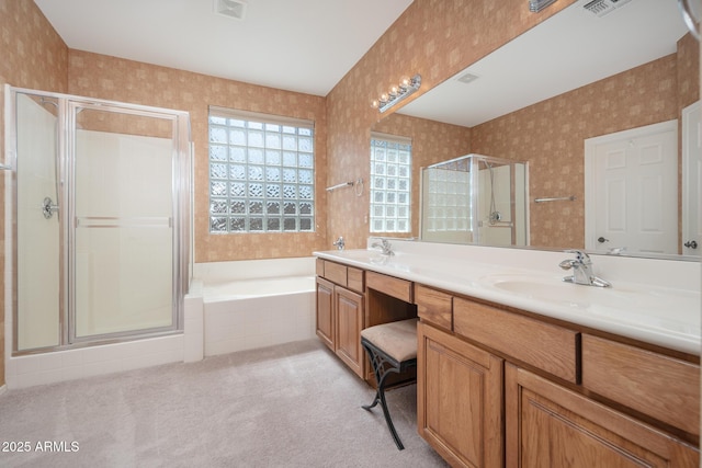 full bath featuring visible vents, a shower stall, wallpapered walls, and a sink