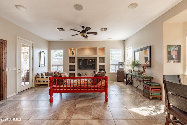 living room featuring ceiling fan