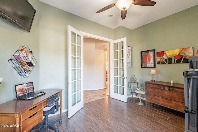 office area featuring french doors, dark hardwood / wood-style flooring, and ceiling fan