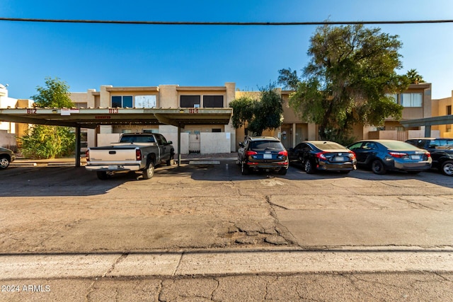 view of front of property with a carport