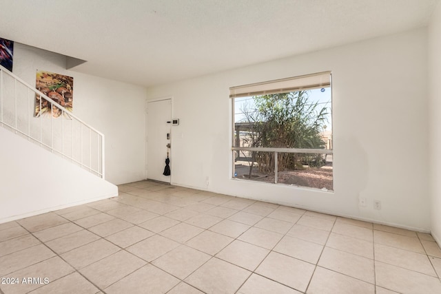 view of tiled spare room