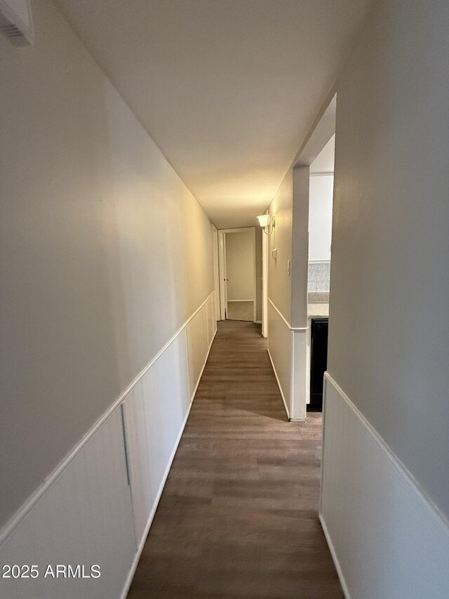 corridor with wood finished floors