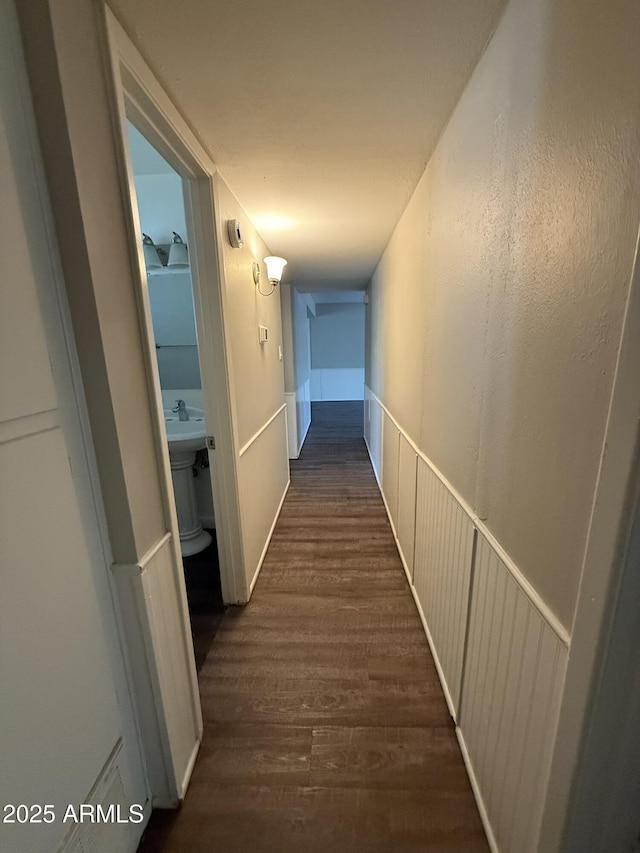 hall featuring dark wood finished floors
