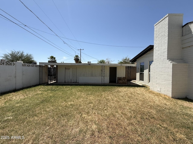 view of yard with fence