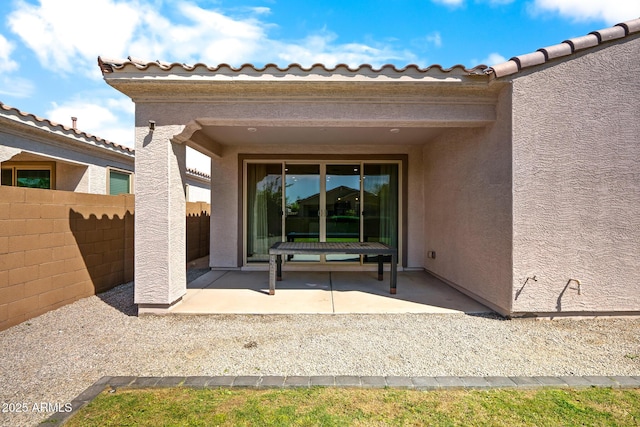 view of patio / terrace with fence