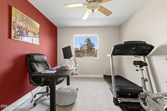 office with carpet floors and ceiling fan