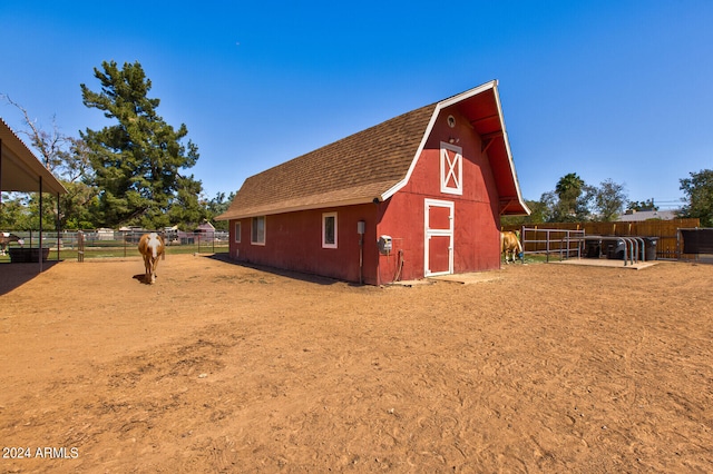 exterior space with an outbuilding