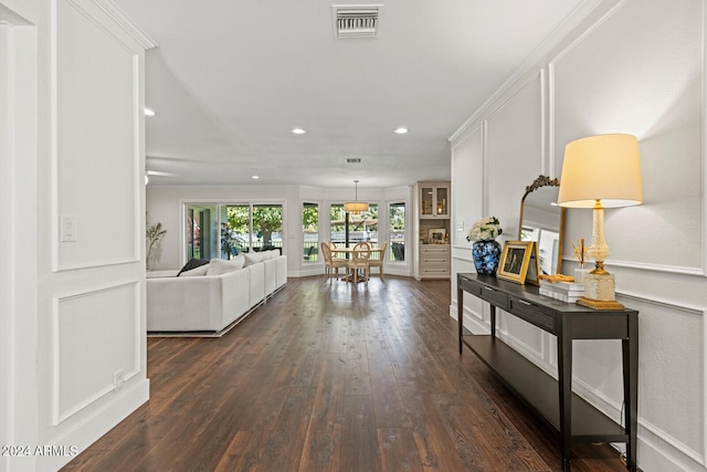 hallway featuring dark hardwood / wood-style floors