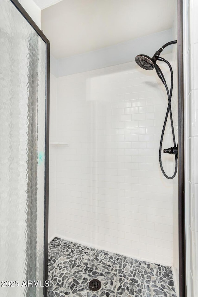 bathroom featuring a stall shower