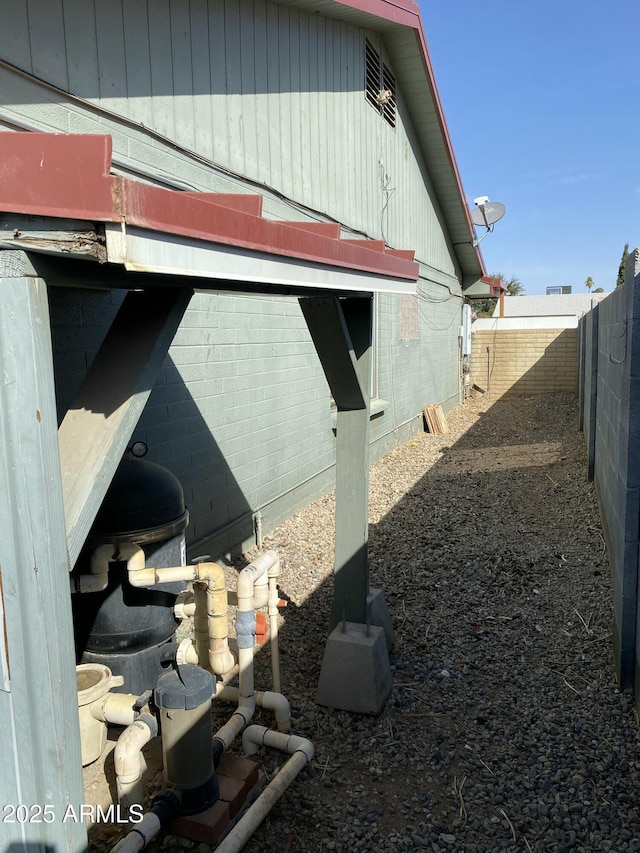 view of home's exterior with fence private yard