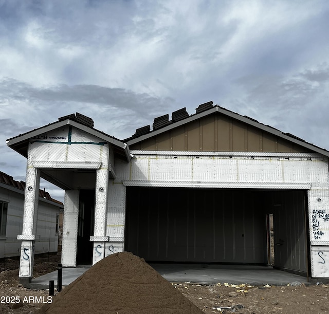 5678 N 205th Ln, Buckeye, AZ 85396 - property in mid-construction with board and batten siding