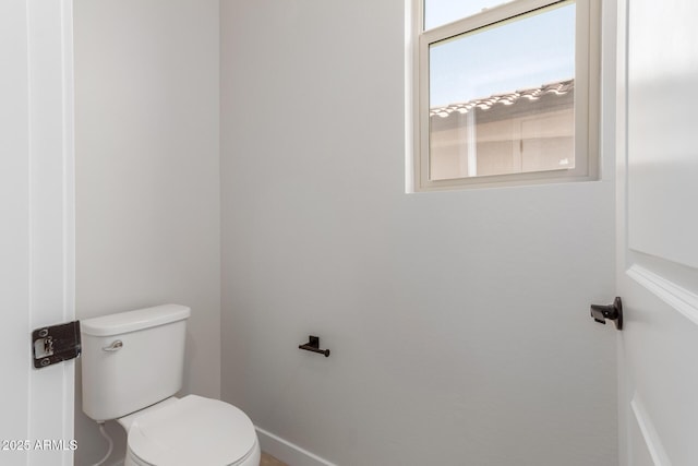 5678 N 205th Ln, Buckeye, AZ 85396 - bathroom with toilet and baseboards