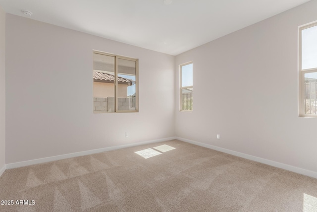 5678 N 205th Ln, Buckeye, AZ 85396 - carpeted empty room with baseboards and a smoke detector