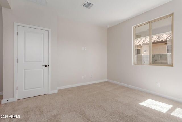 5678 N 205th Ln, Buckeye, AZ 85396 - empty room featuring carpet flooring and baseboards