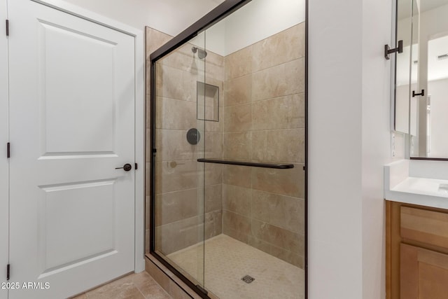 5678 N 205th Ln, Buckeye, AZ 85396 - bathroom with a shower stall and vanity