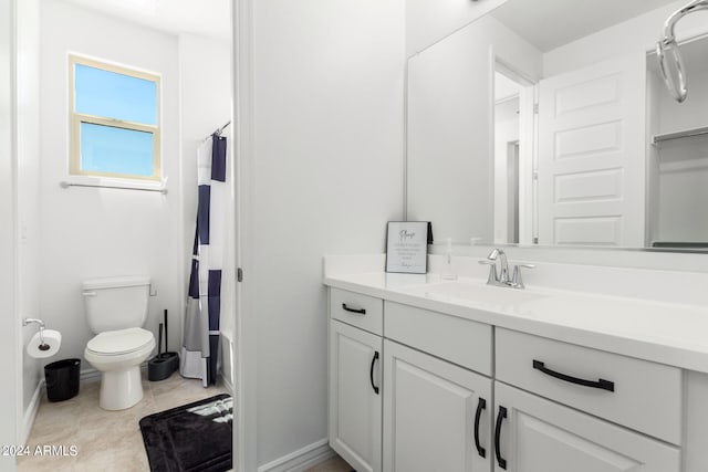 full bathroom with vanity, shower / bath combination with curtain, and toilet