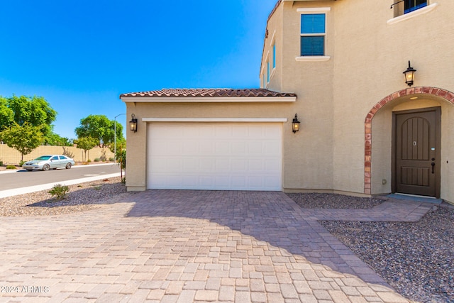 view of front of house with a garage