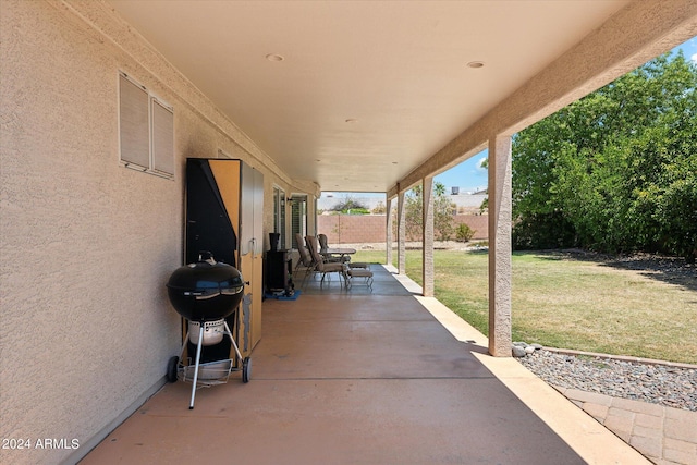 view of patio with a grill