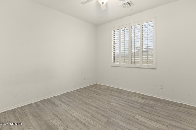 unfurnished room with light hardwood / wood-style floors and ceiling fan