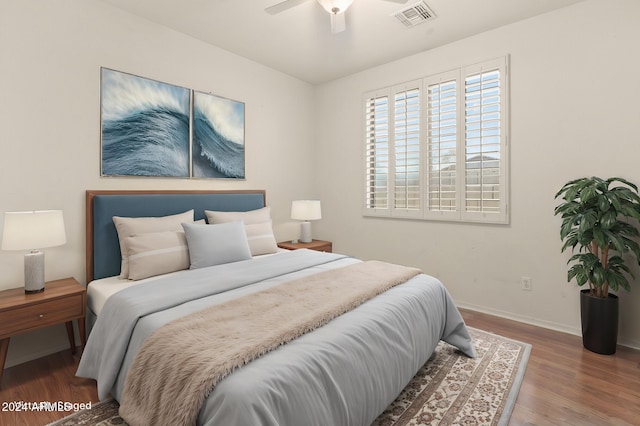 bedroom featuring wood-type flooring and ceiling fan