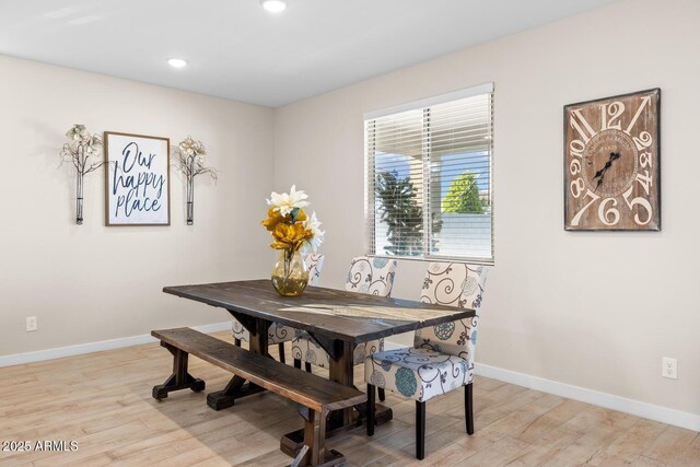 dining area with recessed lighting, baseboards, and light wood-style floors