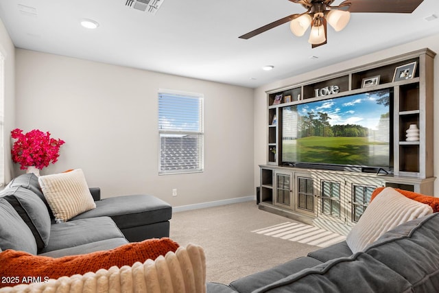living area featuring visible vents, ceiling fan, baseboards, recessed lighting, and carpet
