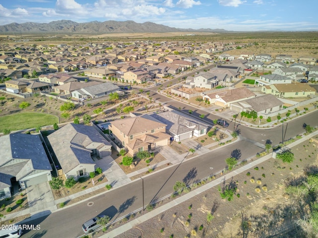 drone / aerial view featuring a mountain view and a residential view