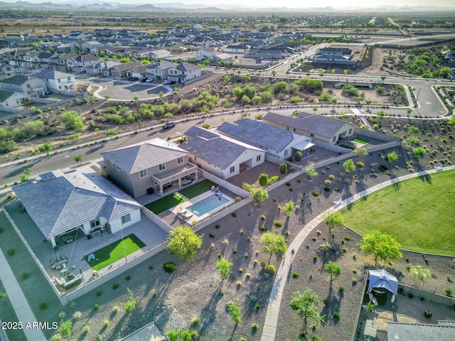 aerial view featuring a mountain view and a residential view