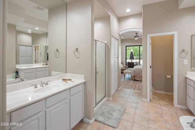 full bath with a ceiling fan, visible vents, a shower stall, and vanity