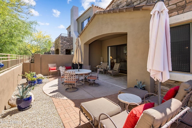 view of patio / terrace with fence and outdoor dining area