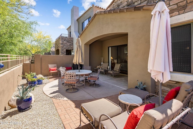 view of patio / terrace with fence and outdoor dining area